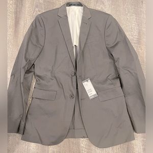 An H&M matching top and bottom suit! Suit is grey and brand new.